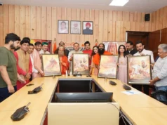 CM धामी ने बाबा नीब करौरी महाराज पर फिल्म का पोस्टर लॉन्च किया