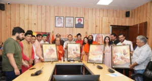 CM धामी ने बाबा नीब करौरी महाराज पर फिल्म का पोस्टर लॉन्च किया